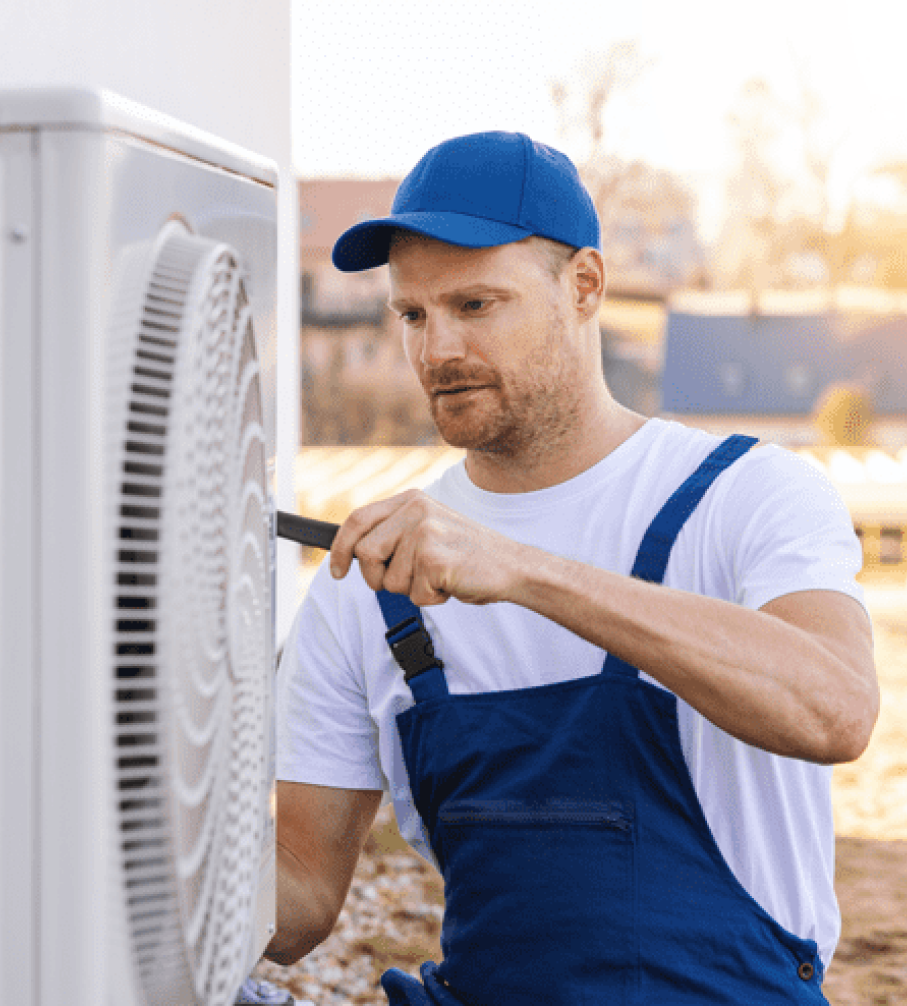 technician fixing a boiler