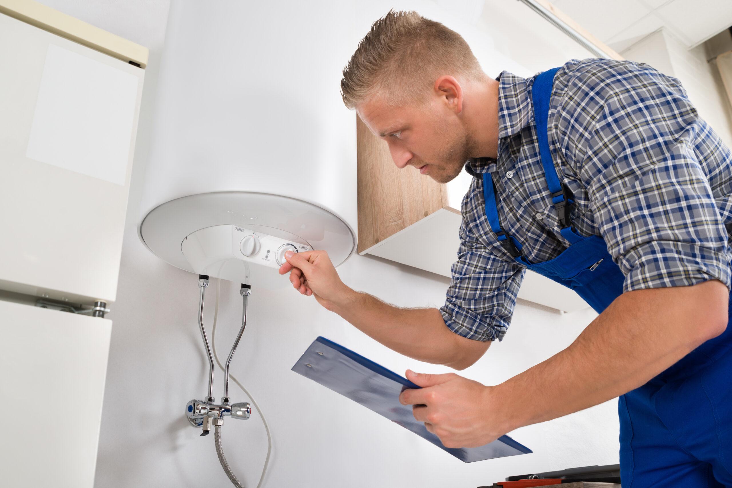 technician fixing a boiler